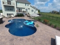 Fiberglass Pool with Tanning Ledge, Bubblers and Deck Jets